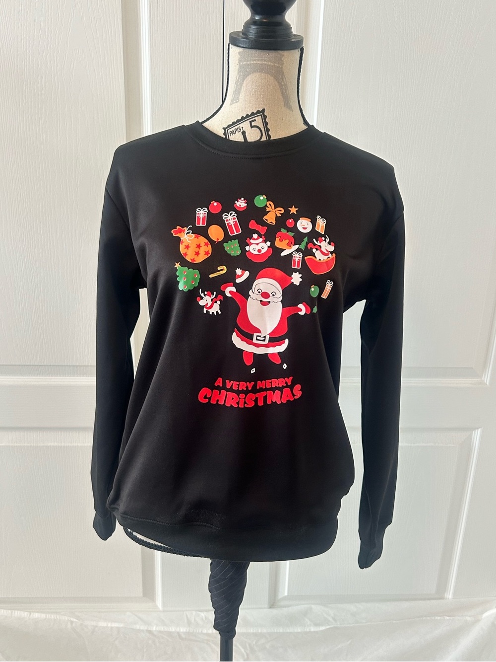 Black Kids' Christmas Sweater with Santa Graphic